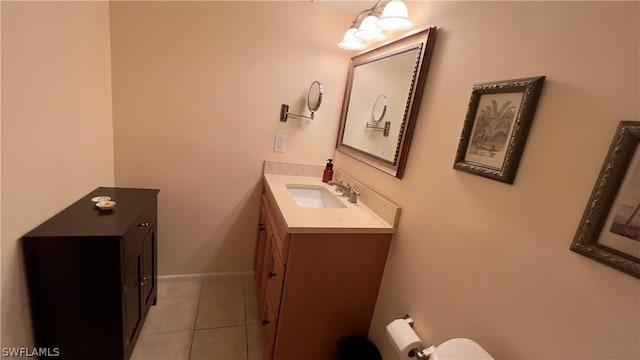 bathroom with tile patterned floors and vanity