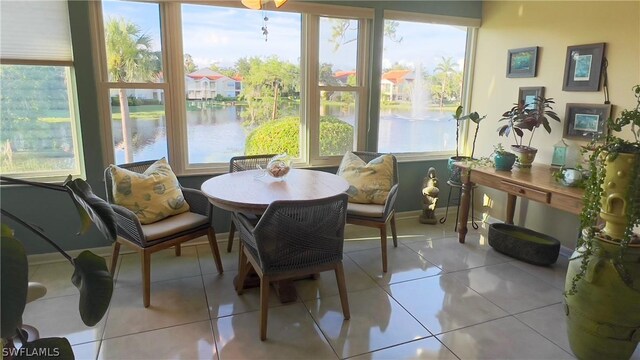 sunroom with a water view