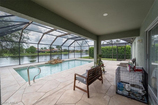 view of pool featuring a lanai, a patio, and a water view