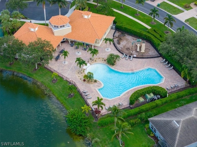 birds eye view of property with a water view