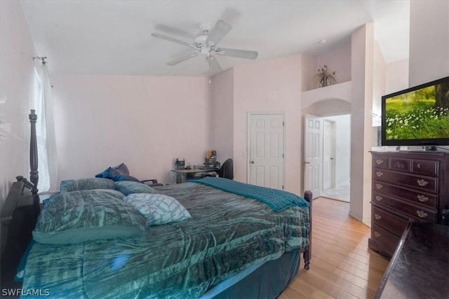 bedroom featuring light hardwood / wood-style floors and ceiling fan