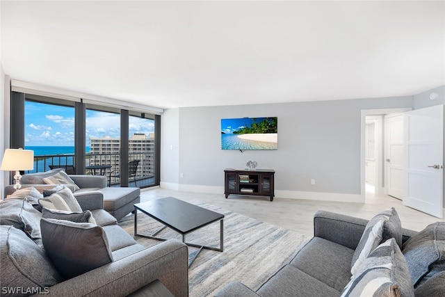 living room featuring a water view