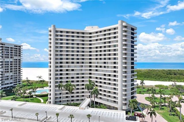 view of building exterior with a water view