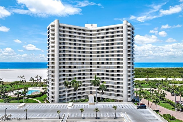 view of building exterior with a water view