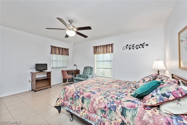 bedroom featuring ceiling fan and light tile patterned floors