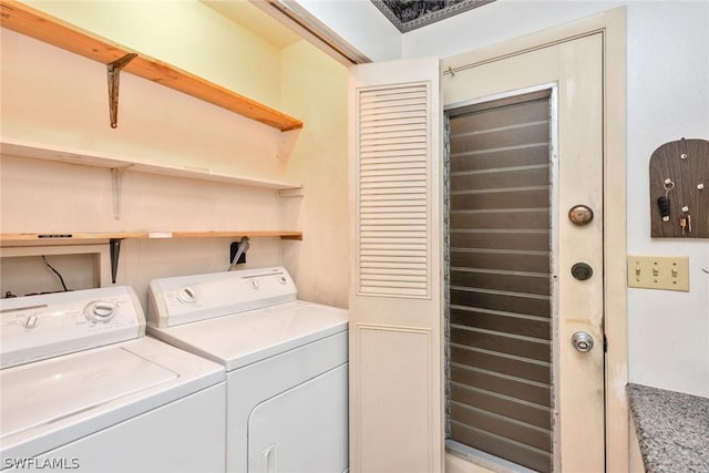 clothes washing area with independent washer and dryer