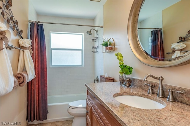 full bathroom featuring tile patterned floors, vanity, toilet, and shower / bathtub combination with curtain