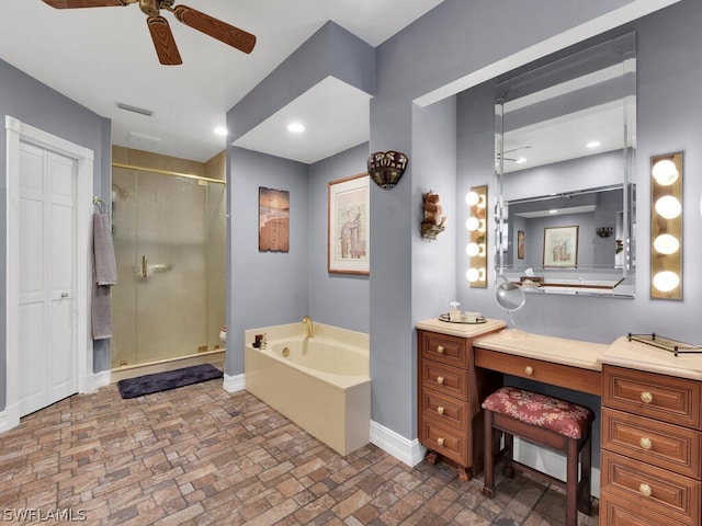 bathroom featuring vanity, separate shower and tub, and ceiling fan