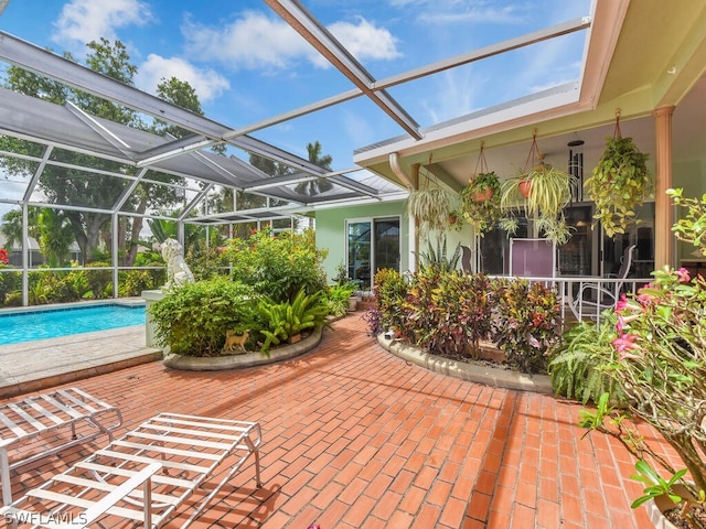 view of patio / terrace featuring a lanai