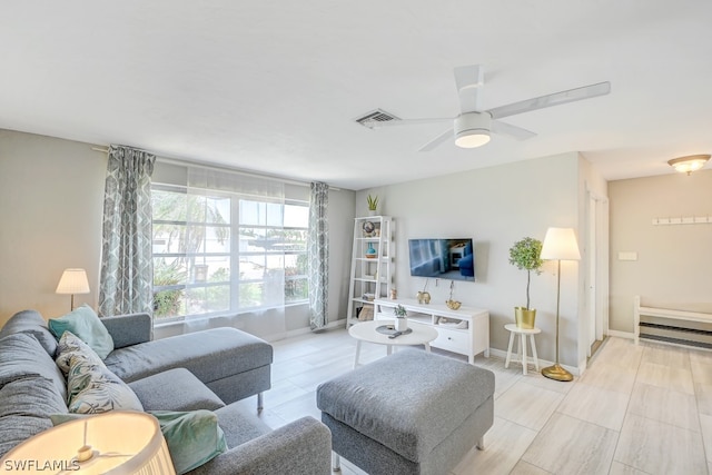 living room with ceiling fan