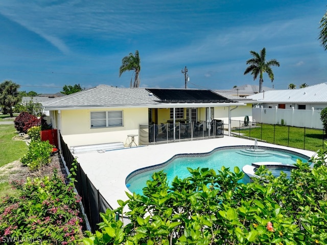 view of pool featuring a lawn and a patio area