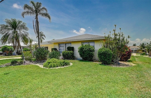 view of home's exterior featuring a lawn