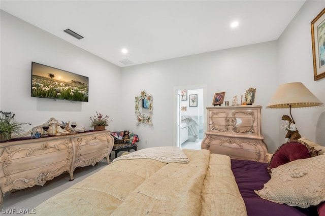 carpeted bedroom featuring connected bathroom