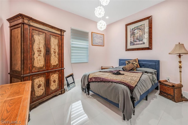 bedroom with light tile flooring