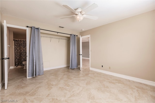 unfurnished bedroom featuring a closet, light tile flooring, and ceiling fan