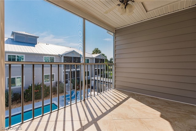 balcony featuring ceiling fan