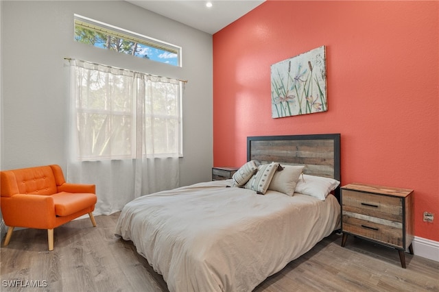 bedroom featuring hardwood / wood-style floors