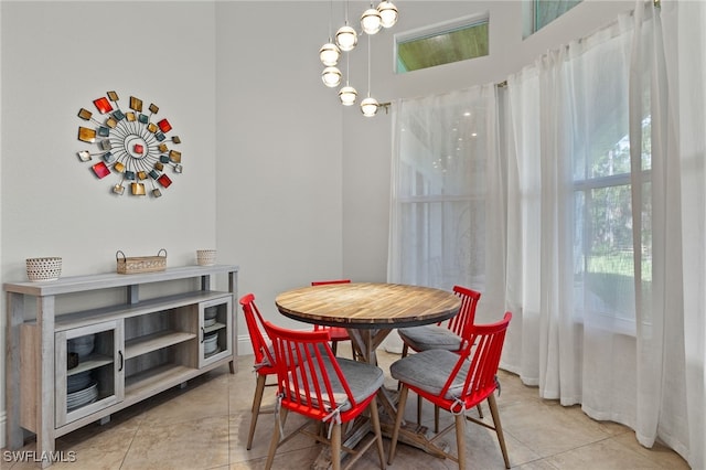 dining room featuring light tile patterned flooring