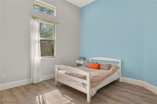 bedroom featuring hardwood / wood-style floors