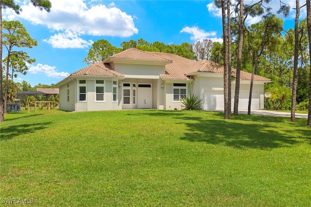 exterior space with a yard and a garage