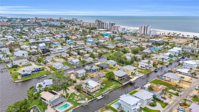 drone / aerial view with a water view and a view of city