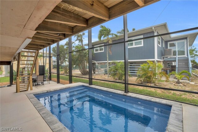 view of pool featuring a patio area