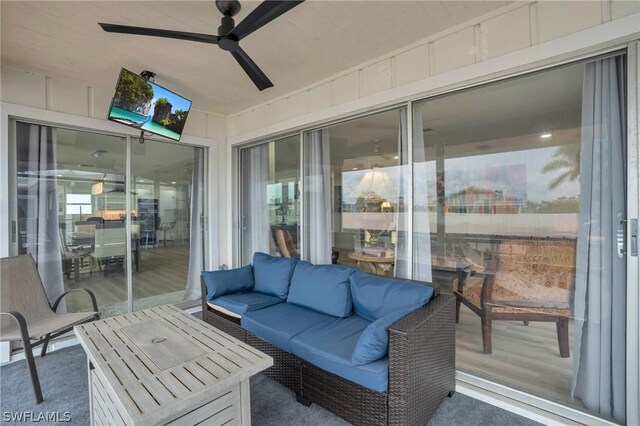 exterior space featuring an outdoor hangout area and ceiling fan