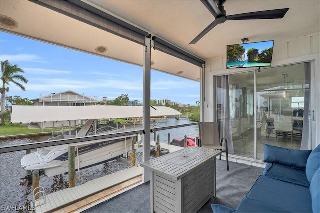 balcony featuring a ceiling fan