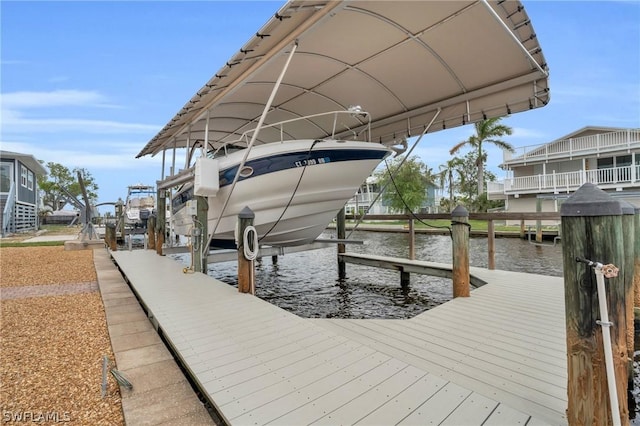 dock area featuring a water view