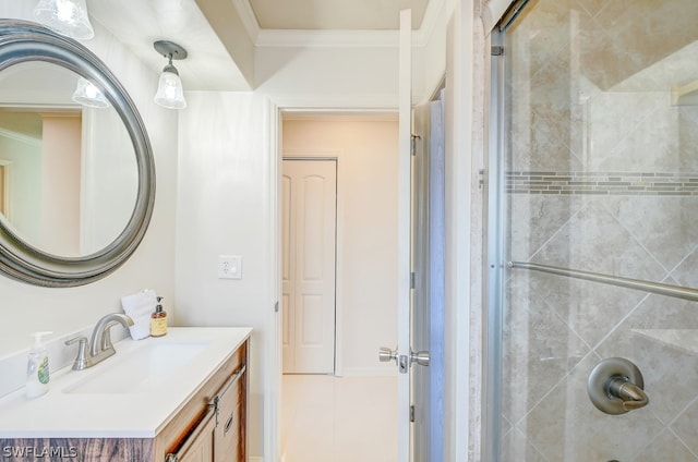 bathroom with vanity and ornamental molding