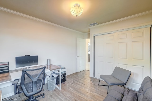 office area featuring crown molding and light wood-type flooring