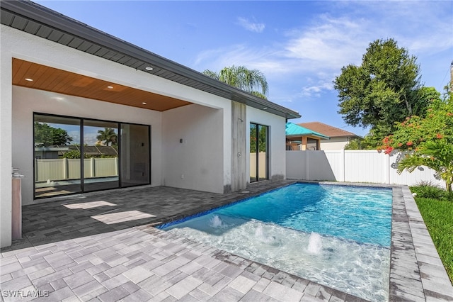 view of pool with a patio area