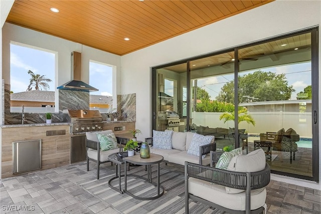 689 101st Ave N, Naples, FL 34108 - view of patio / terrace featuring an outdoor hangout area and a sink