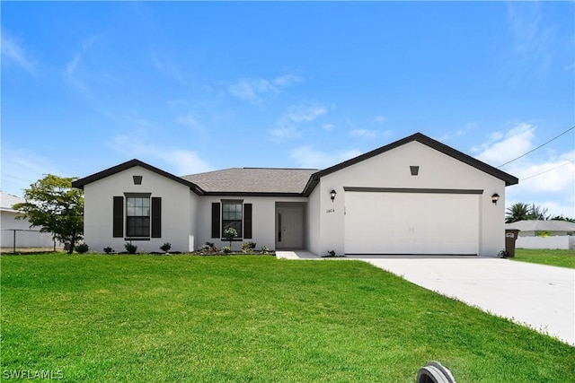 ranch-style home featuring a front lawn and a garage