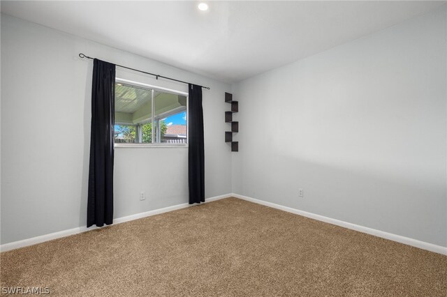 empty room featuring carpet