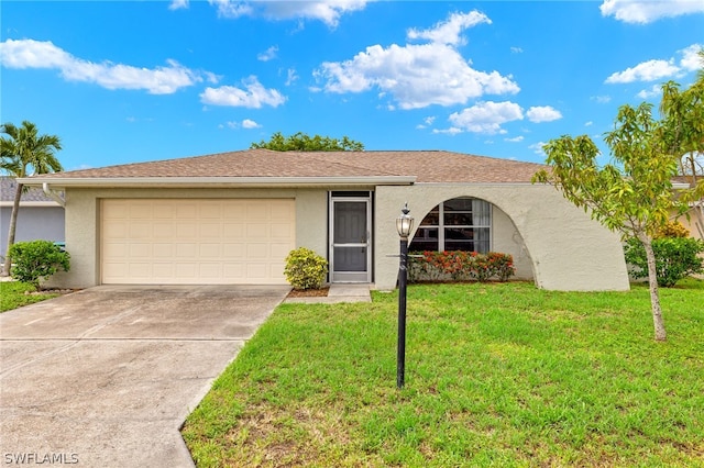 ranch-style home with a front lawn and a garage