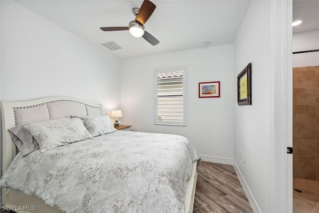 bedroom featuring ceiling fan and light wood-type flooring