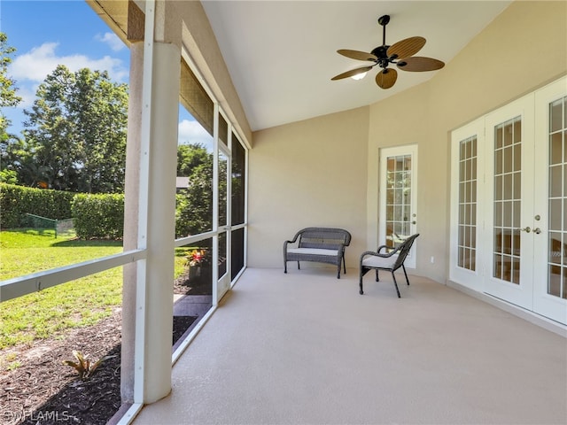 sunroom with ceiling fan and french doors