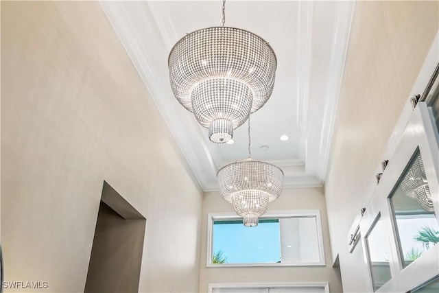 room details with a chandelier, crown molding, and recessed lighting