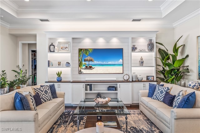 living room with dark hardwood / wood-style flooring and crown molding