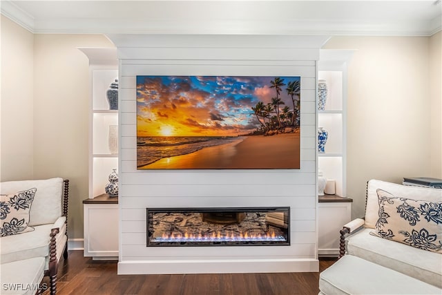 living area with a large fireplace, dark hardwood / wood-style flooring, and crown molding