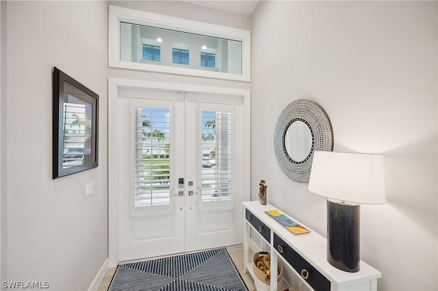 1641 Orleans Ct, Marco Island, FL 34145 - doorway featuring french doors and baseboards