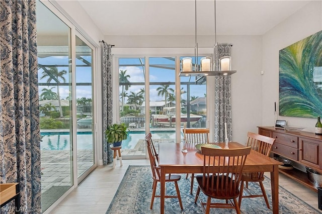 1641 Orleans Ct, Marco Island, FL 34145 - dining room featuring light wood-type flooring