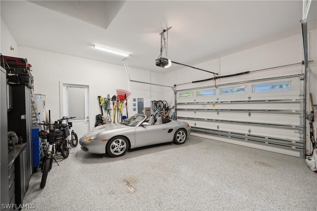1641 Orleans Ct, Marco Island, FL 34145 - garage featuring a garage door opener