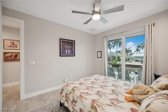 1641 Orleans Ct, Marco Island, FL 34145 - bedroom with access to outside, light wood-style floors, baseboards, and a ceiling fan