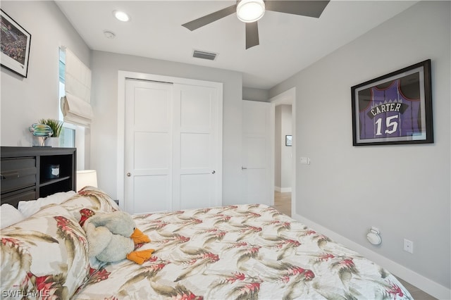 bedroom featuring a closet and ceiling fan