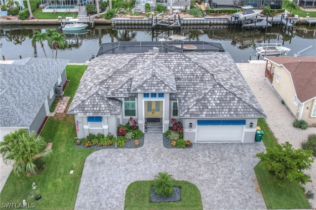 drone / aerial view with a water view