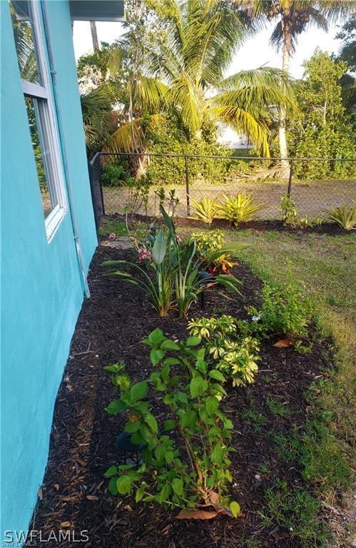 3200 Barrett Ave, Naples, FL 34112 - view of yard with fence