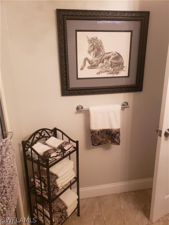 3200 Barrett Ave, Naples, FL 34112 - room details featuring baseboards