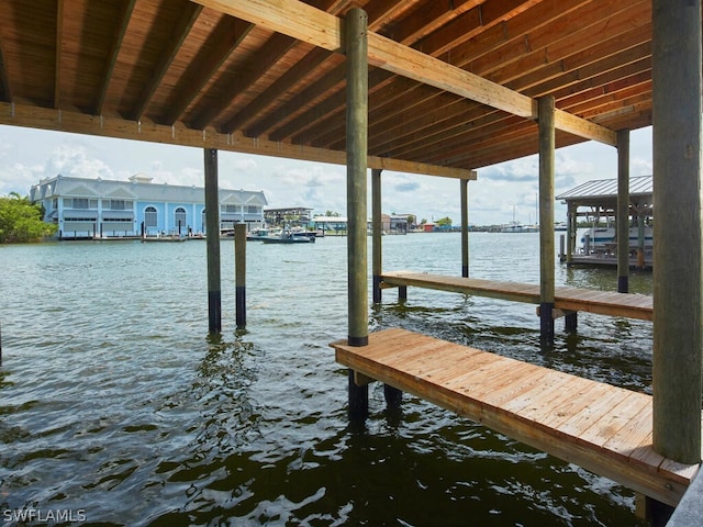 view of dock with a water view